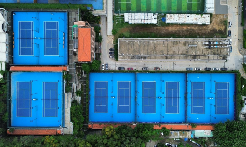 hard court tennis multiple connected tennis courts photo