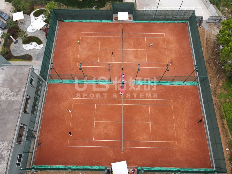 tennis court windscreens installation aerial view