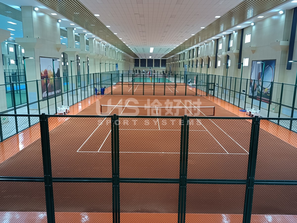 actual on-site photo showing multiple tennis clay courts connected together