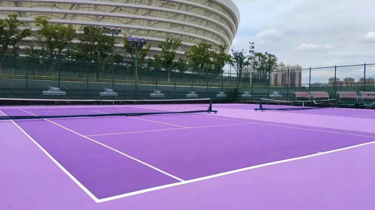 Suzhou Olympic Sports Center | Project Case 2 sports facility construction on purple acrylic surface